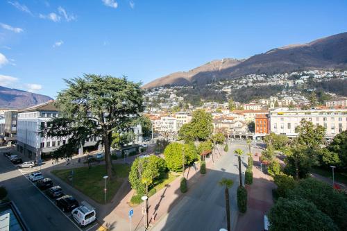 an aerial view of a city with a mountain at Casa Cupido Locarno - Happy Rentals in Locarno