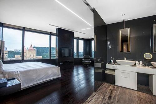 Postel nebo postele na pokoji v ubytování Shenzhen O Hotel