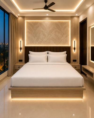 a bedroom with a bed and a large window at Hotel La Serene in Agra