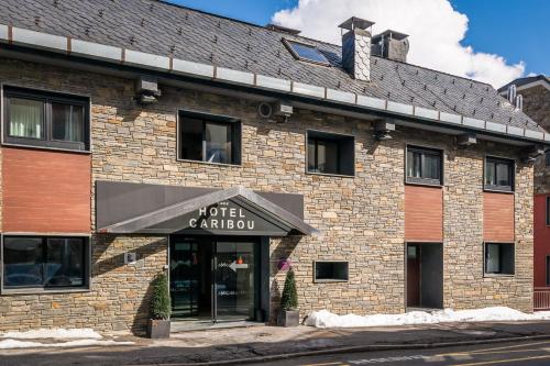 a hotel camolis building with an awning at Estival Caribou in Pas de la Casa
