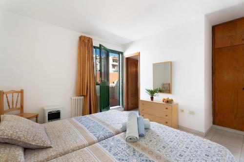 Postel nebo postele na pokoji v ubytování Hotel Germán