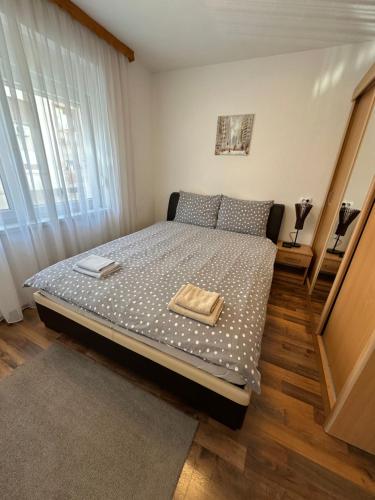a bedroom with a bed in a room at Apartman Lara Laktasi in Laktaši