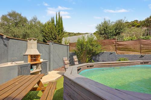 Apartamento con jardín y piscina