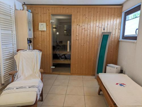 a hospital room with a pair of beds and a window at Ferienapartment Erdmann in Münster