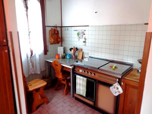 Kuchyň nebo kuchyňský kout v ubytování B&B Arcobaleno