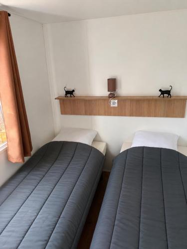 Mobil home neuf 35m2 clim fibre tv 3 chambres plage à 2 min 6 personnes