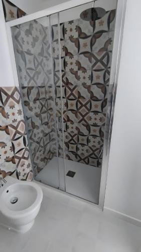 a bathroom with a sink and a mirror at Dimora Collina 3 in Sannicola