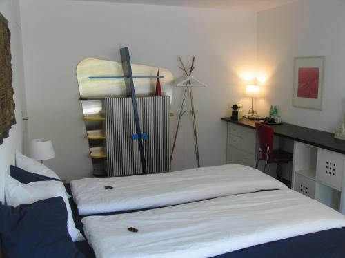 
Ein Bett oder Betten in einem Zimmer der Unterkunft Gästezimmer Galmisbach
