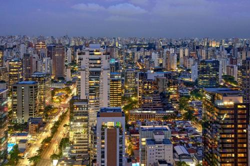 a large city at night with many tall buildings at W Sao Paulo in São Paulo