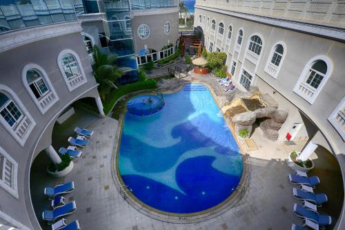 Vaade basseinile majutusasutuses Sharjah Premiere Hotel & Resort või selle lähedal
