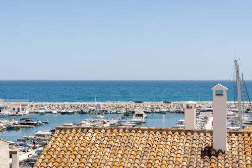 MARBELLA BANUS SUITES - Brand New Luxury Duplex - Puerto Banús Marina - 2BR - 2BA - Spectacular Mediterranean Views - Heart of Puerto Banús - Steps from El Corte Inglés Luxury Shopping - Surrounded by Restaurants & Nightlife