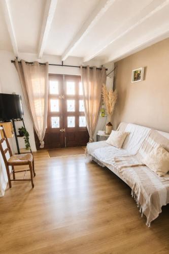 a bedroom with a bed and a tv in it at Chez T-E-O in Cognac