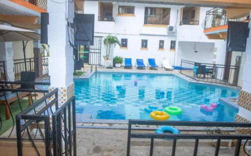 a pool in the middle of a building at Silent breeze home in Mombasa