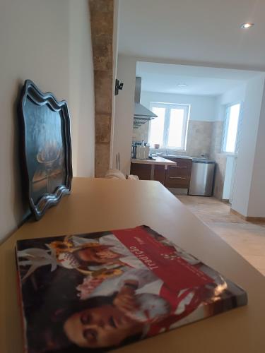 a magazine sitting on top of a table at Tomarhousing - Style in Tomar
