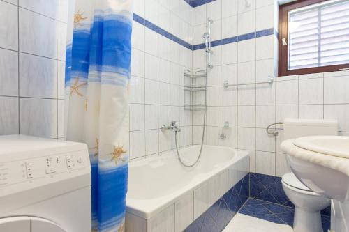 Ванна кімната в Apartment Polugic