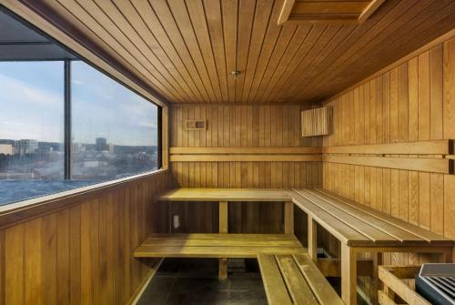 an empty sauna with a window in a building at 2BR CBD Apt Swimming Pool Sauna SPA CBD in Adelaide