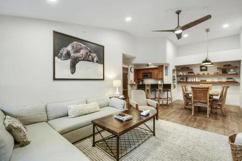 a living room with a couch and a table at River Pines A303 condo in Edwards