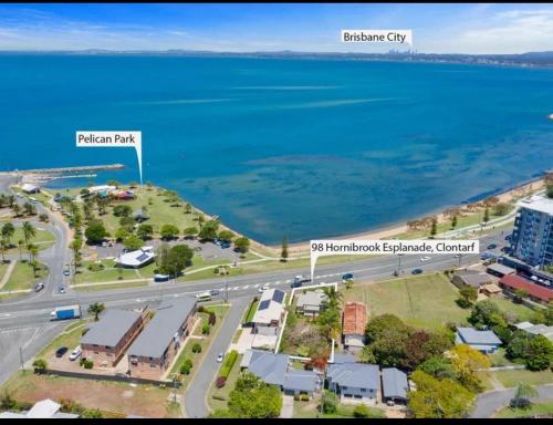 an aerial view of a city and the ocean at Beach View Cottage in Clontarf
