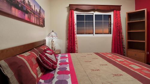 Ένα ή περισσότερα κρεβάτια σε δωμάτιο στο Paradise House Calheta
