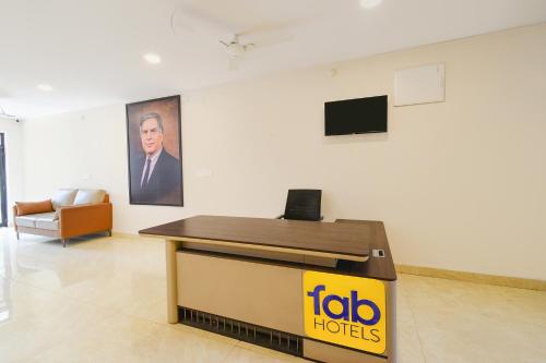 a lectern in a room with a picture of a president at FabHotel Latitude in Hyderabad