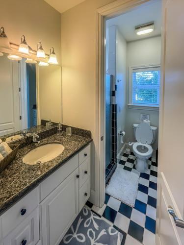a bathroom with a sink and a toilet at Serrano Village Villa in El Dorado Hills