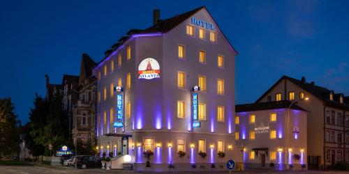 a building with blue lights on the side of it at Atlanta Budget Darmstadt in Darmstadt