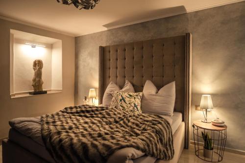Luxury Apartments No. 91 tesisinde bir odada yatak veya yataklar