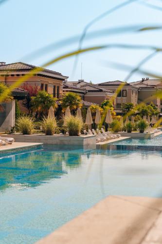 a view of a swimming pool at a resort at Green Life Apartments Sozopol in Sozopol