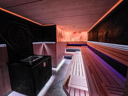 a room with a row of bowling lanes at Hotel Lärchenhof in Kaunertal