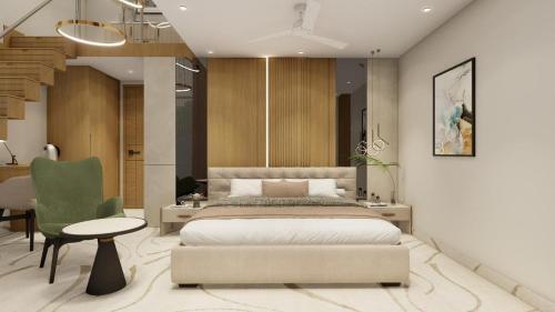 a bedroom with a bed and a table and a chair at Hotel Vaarya Inn in Lucknow