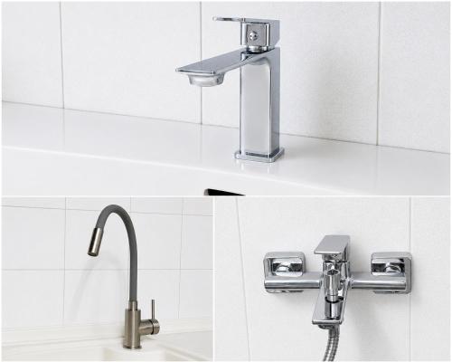 a sink and a faucet in a bathroom at Pefkostalia in Pefkochori