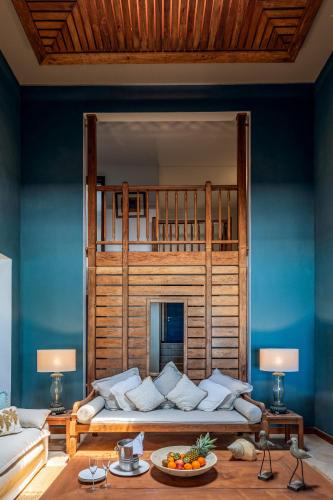 a living room with a couch and a bunk bed at Villa Itzaga by muse villas in Post of Flacq