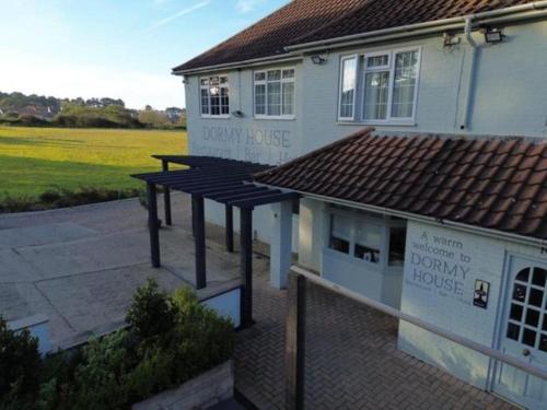 an overhead view of a house with a building with a porch at The Dormy House Hotel in Cromer
