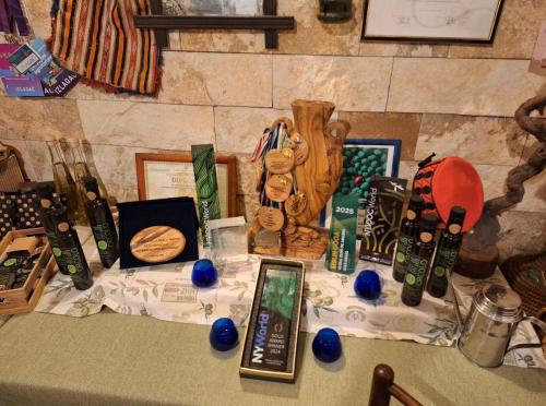 a table with a remote control and other items on it at Camp Oblica - parcela - empty plot in Pirovac