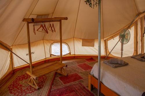 a room with a tent with a bed in it at Paraiso Bell Tent - Glamping with Pool in Nature in Tortosa