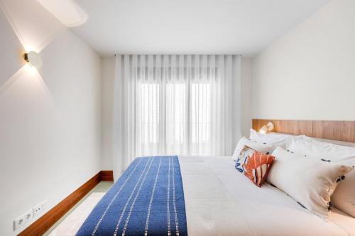 1BR Flats with AC | Porto Urban Gardens