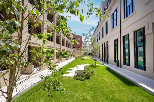 1BR Flats with AC | Porto Urban Gardens