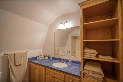 a bathroom with a sink and a mirror at Agape Aldea in Jamestown