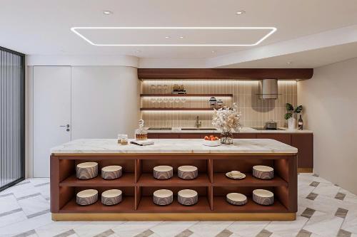 a kitchen with a large island in the middle at Ben Thanh Luxury Hotel - Premium Kas Dilly & Spa in Ho Chi Minh City