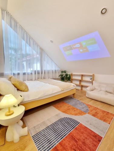a bedroom with a bunk bed and a window at The Courtyard Heritage Pool Villa Udonthani in Udon Thani