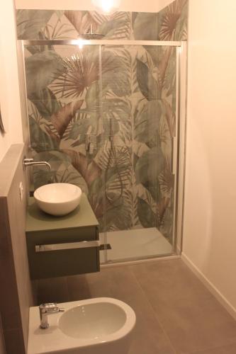 a bathroom with a shower and a sink at Bonbon in Treviso