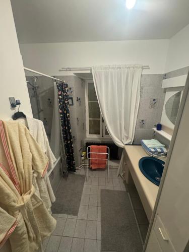 a bathroom with a sink and a mirror at Douce Demeure - Hôtel-Restaurant de Mortemart in Mortemart