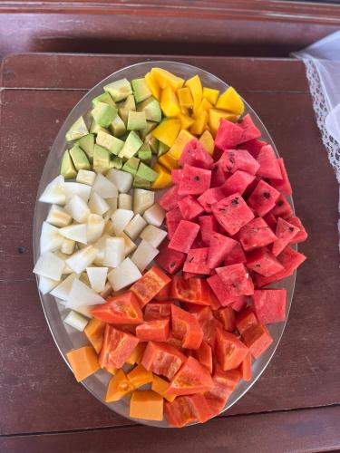 a plate of different types of vegetables on a table at Praia Grande Ecolodge in Manacapuru