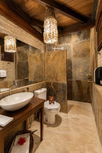 a bathroom with a sink and a toilet in it at Casa Fufi in Jericoacoara