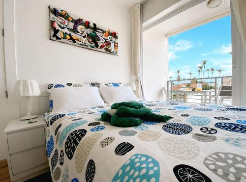 a bedroom with a bed with a stuffed animal on it at Beach Pool Hotel Punta Cana in Punta Cana