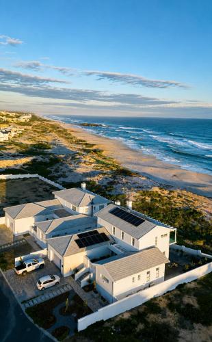 an aerial view of a building on the beach at Jonesy's Place on the Beach in Yzerfontein