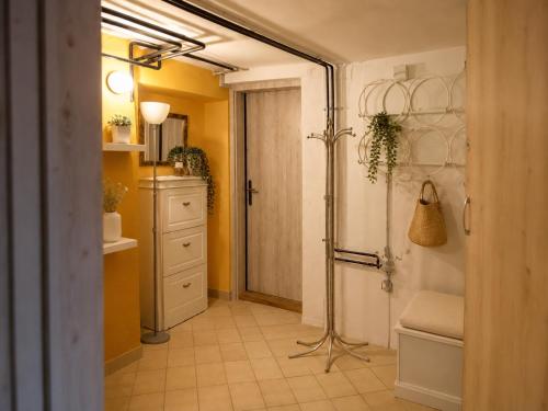 a bathroom with a sink and a shower in a room at RoseArt Nest Studio in Ljubljana