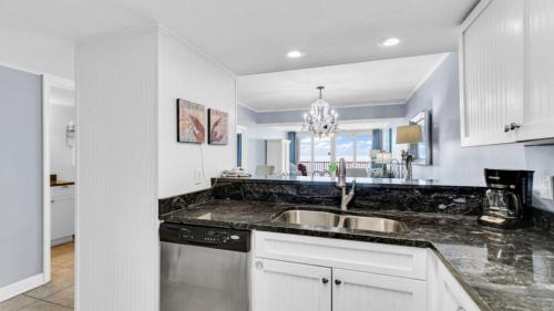 a kitchen with a sink and a counter top at Romar Tower 6B in Orange Beach