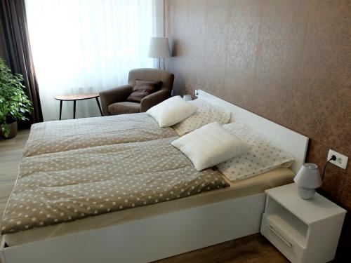 Voodi või voodid majutusasutuse Ljubljana Center Flat toas
