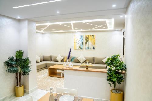 a living room with a couch and a table at Lagoon House Dakhla in Dakhla